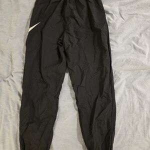 Nike Black Windbreaker Track Pants with White Swoosh
